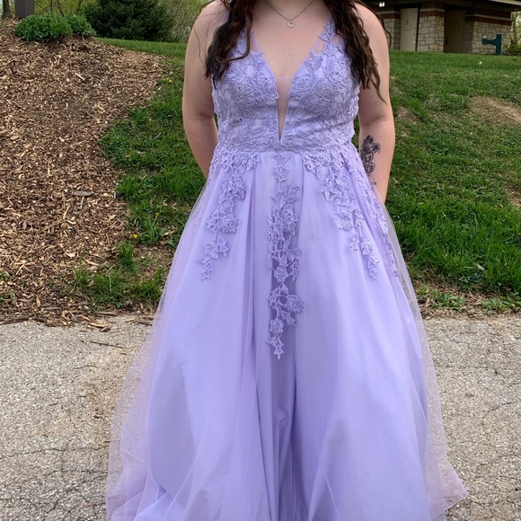 Lavender fairy tale style prom dress size 14 bought at Bella’sworn once .